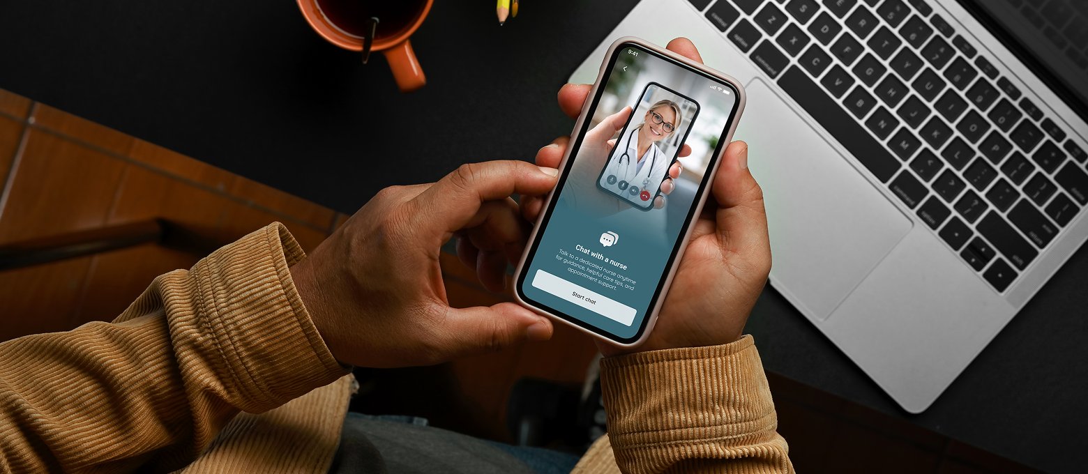 A traveller holding a phone with a Tiba nurse consultation on screen