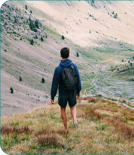 Hiker walking a mountain ridge